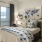 a bedroom with a large window