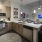 a kitchen with wooden cabinets