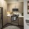 a kitchen with wooden cabinets