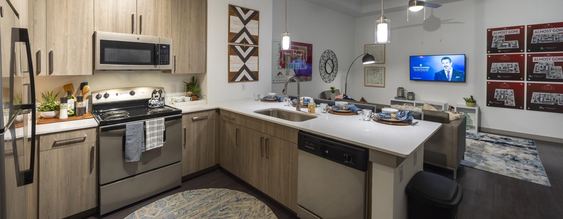 a kitchen with wooden cabinets